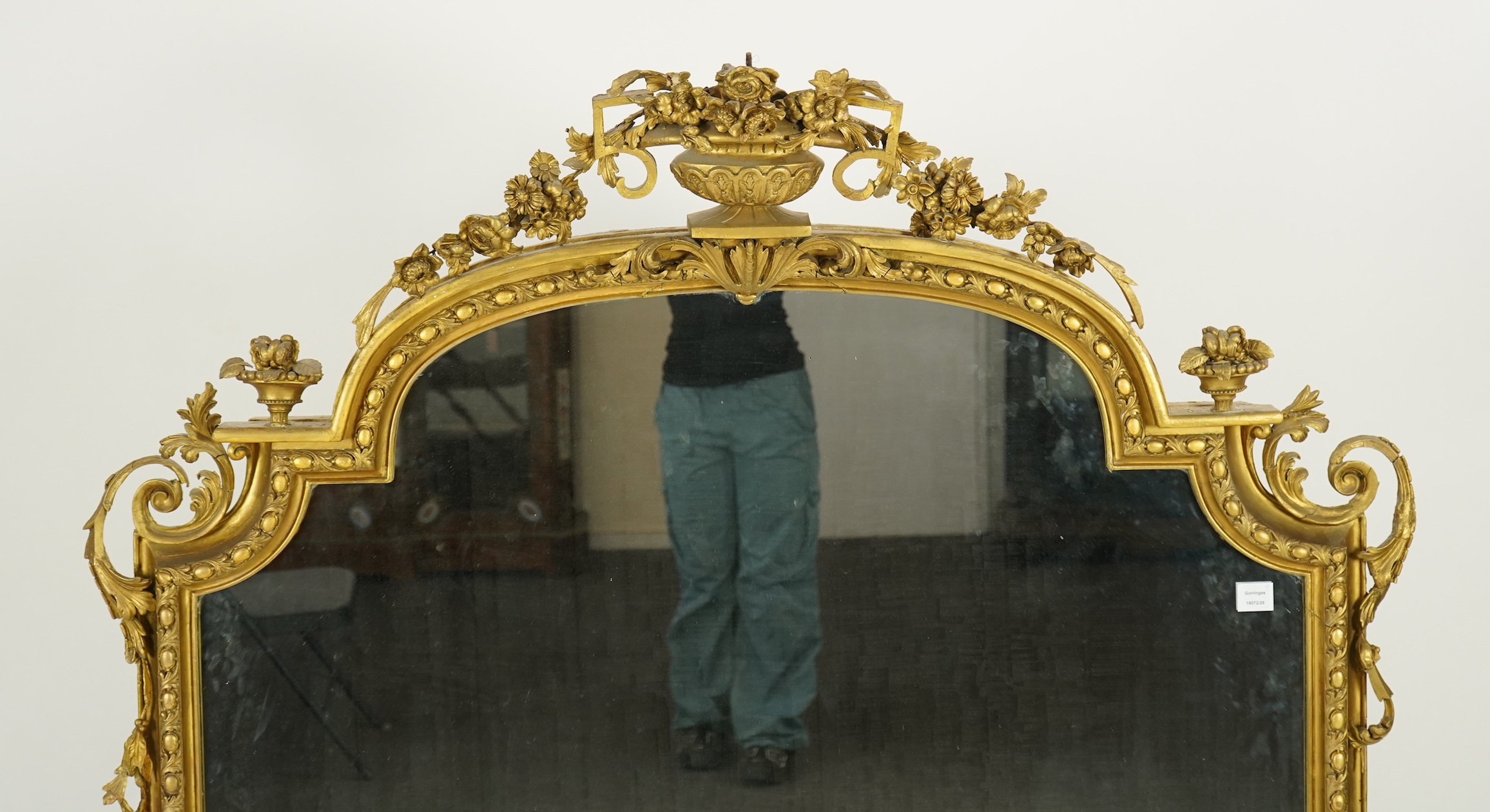 A Victorian giltwood and composition overmantel mirror
